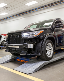 Toyota on vehicle lift | Deacon Jones Toyota in Clinton NC